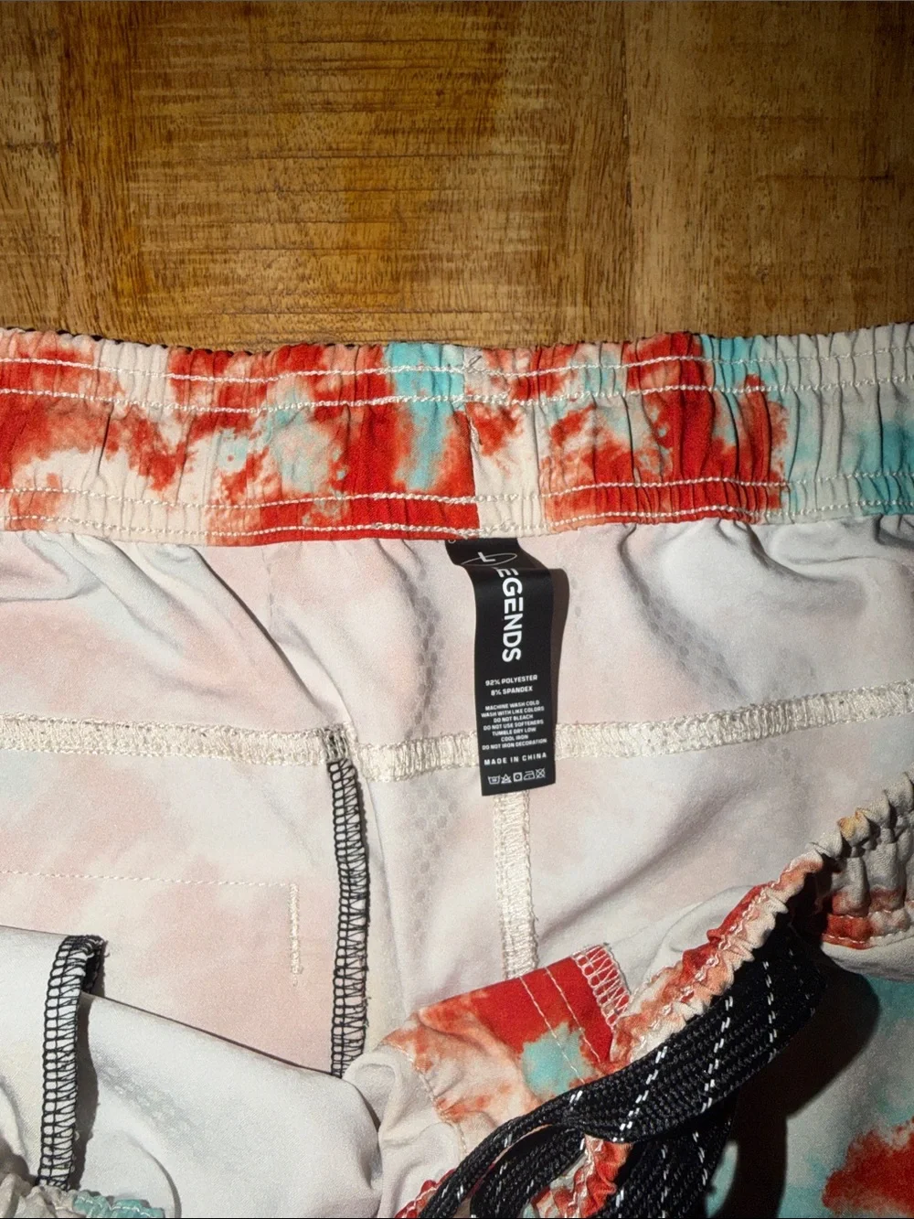 Men’s Tie-Dye Athletic Shorts in Beige with Red, Orange & Blue Accents